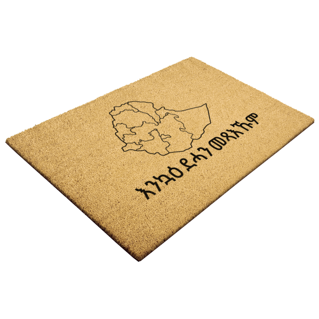 Tigrinya_Welcome_Outdoor_Mat_Trigri_Outdoor_Mat_Angle_Mockup.png_6124444